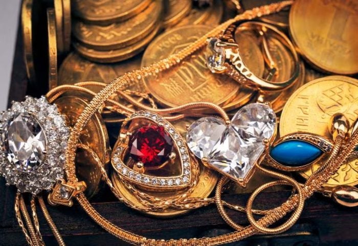A collection of necklaces with diamond and ruby pendants in Houston, TX