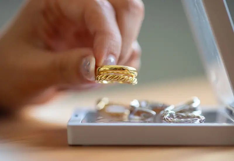 Inspecting gold and white gold rings in Houston, TX