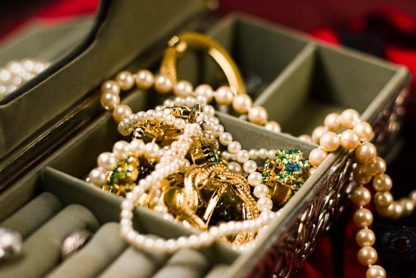Gold and pearl jewelry collection in a jewelry box for cash appraisal in Houston, TX